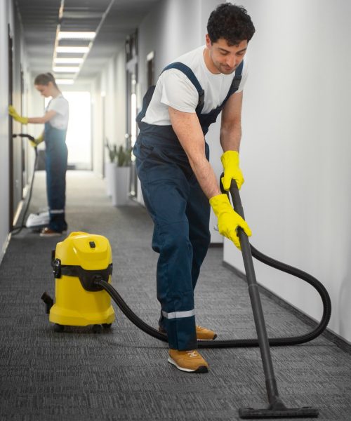 full-shot-people-cleaning-building_23-2150454543